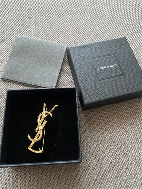 ysl brosche gold|yves Saint Laurent brooch.